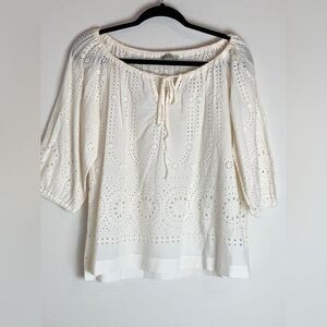 Scarlet Roos: A romantic babydoll-style blouse featuring Broderie Anglais